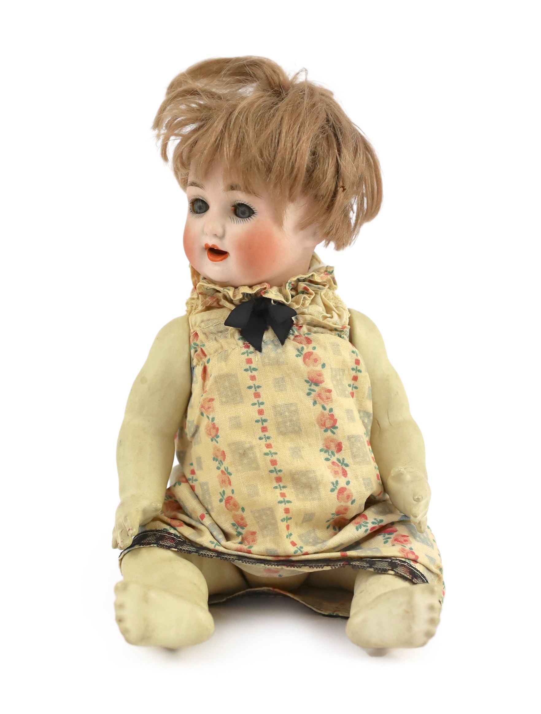 A bisque doll, German, circa 1914, 11in.